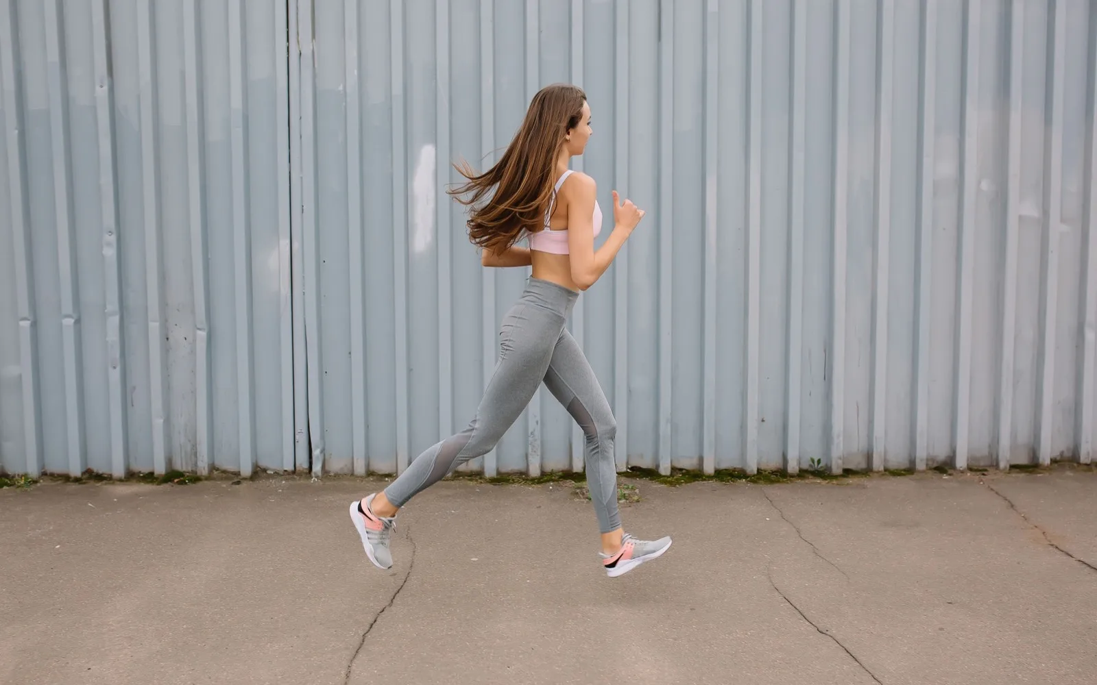 Runner moving outdoors in athletic clothing